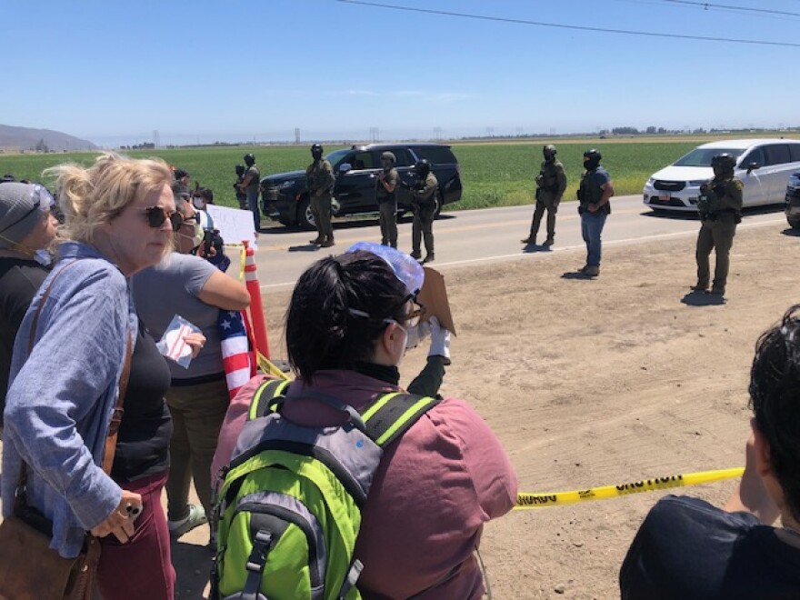Protesters on the outskirts of an immigrantion raid in Camarillo July 10.