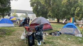 In September, unsheltered people set up dozens of tents in Hawthorne Park in Medford as a form of protest against "clean sweeps" by city police.