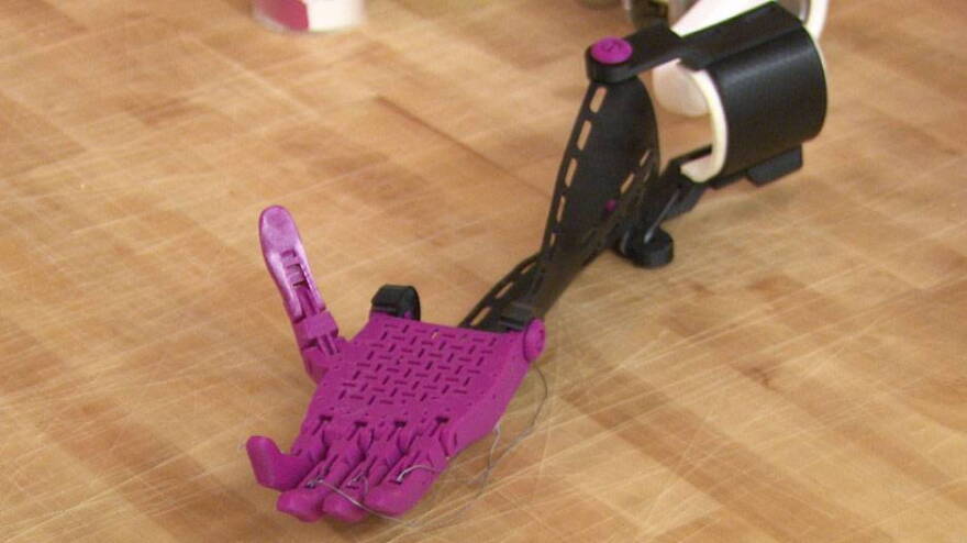 This prosthetic is made from a series of parts made with a 3D printer.