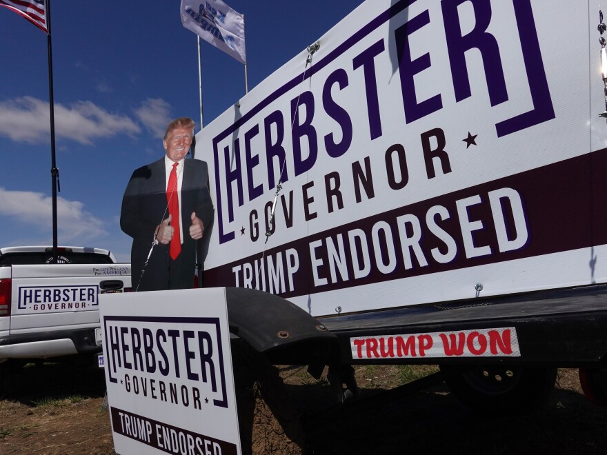 Campaign posters supporting Nebraska Republican candidate for governor Charles Herbster decorate the grounds of the I-80 Speedway prior to the start of a rally with former President Donald Trump on May 1 in Greenwood, Neb.