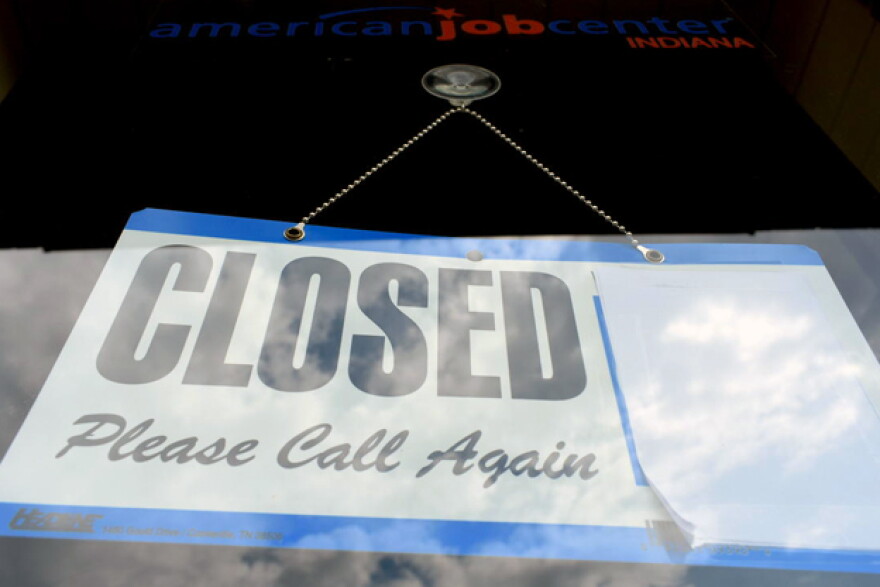 A WorkOne center in Knox, Indiana, displays a closed sign on the front door.