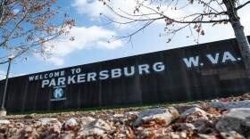 Weathered signage on the Point Park floodwall greets passersby in downtown Parkersburg, West Virginia, on Nov. 20, 2019.