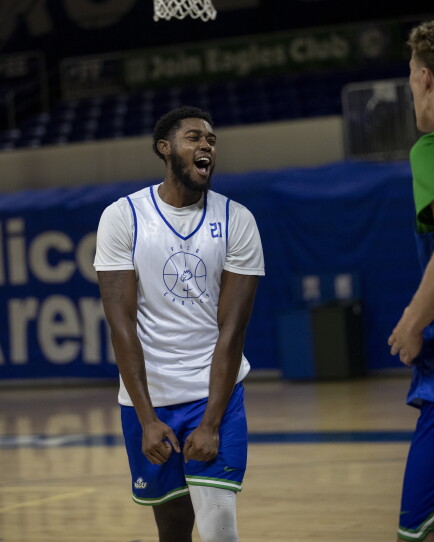 Tristen Guillouette celebrates after a dunk during practice on Monday, Sept. 21, 2026, at FGCU’s Alico Arena.