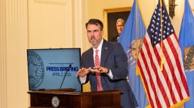 Gov. Kevin Stitt speaks to press at the Oklahoma Capitol on Apr. 2, 2025.