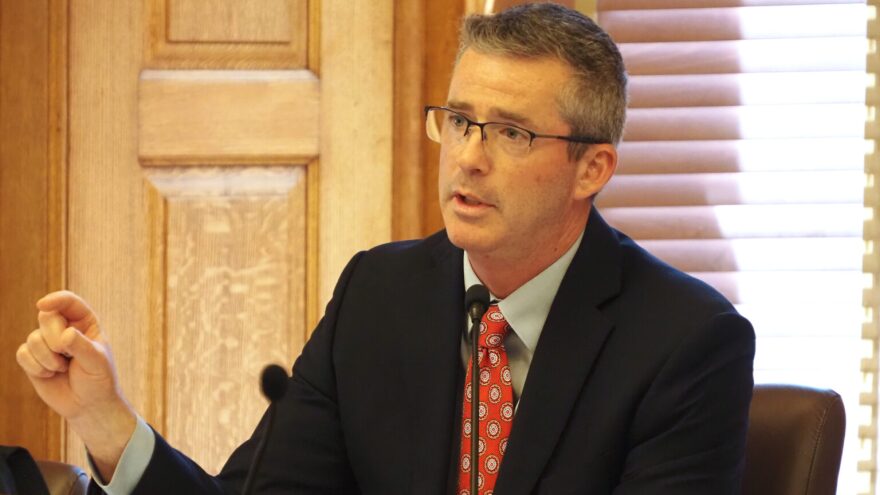 Kansas budget director Adam Proffitt is a nonvoting member of the state’s Education Funding Task Force. He appears here at a press conference on April 20, 2026, at the Statehouse.