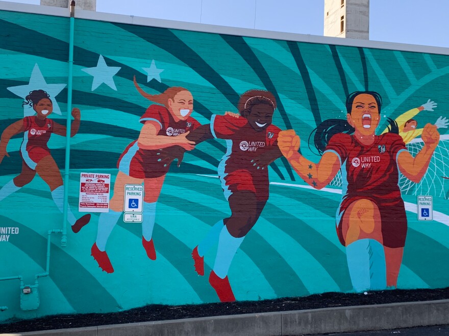 Over the course of just a few years, KC Current fan fever has swept the Kansas City area. You can easily spot teal across the city, players faces plaster billboards and buses, and more and more murals like this one in the Crossroads are popping up.