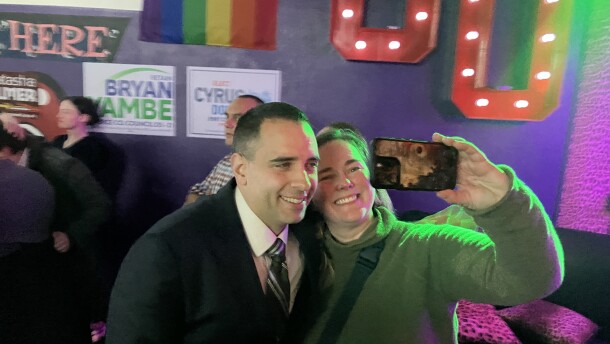 Anders Ibsen takes a selfie with a supporter at election night watch party.