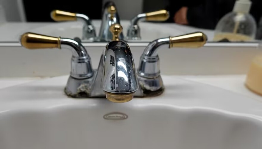 In this Jan. 15, 2023, file photo, the faucet in Ana Maria Rodriguez's bathroom sink shows signs of corrosion, possibly due to nitrate pollution in Boardman, Ore. A report issued Wednesday shows nitrate pollution in the region has gotten worse.