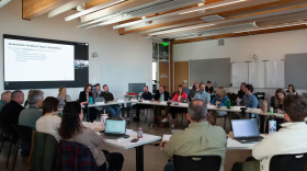 People sit around a table