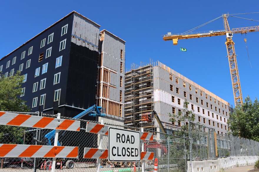 The first phase of the Next Generation Housing Development Plan, under construction on July 8, 2026, is set to be completed in Fall 2027.