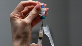 Lauren Ellenburg, a nurse, prepares a combination measles, mumps and rubella vaccine for a 12-month-old at Tiger Pediatrics in Easley, S.C., on March 17, 2026.
