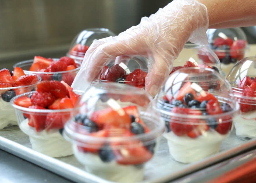 Fresh fruit parfaits are prepared for lunch at Park Road Elementary School in Pittsford.