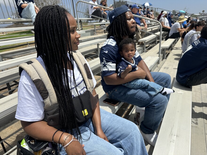 Dallas Cowboys fans Persia Mayo with her husband, Joshua Busby, and their son Joshua Busby Junior at the team's training camp in Oxnard.