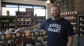 Electric vehicle owner Able Blakley in his Oklahoma City spice shop. 