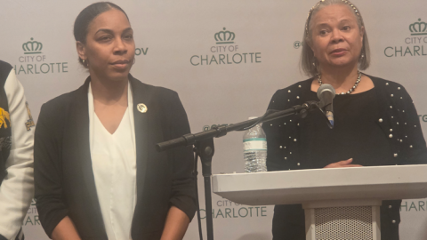 Mayor Vi Lyles (right) speaks during a news conference about an investigation into comments made by City Council member Victoria Watlington (left).