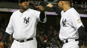 The New York Yankees' deep pockets allow them to keep stars like Derek Jeter (right), even as the club adds free agents like pitcher CC Sabathia, a key component on last year's championship team.