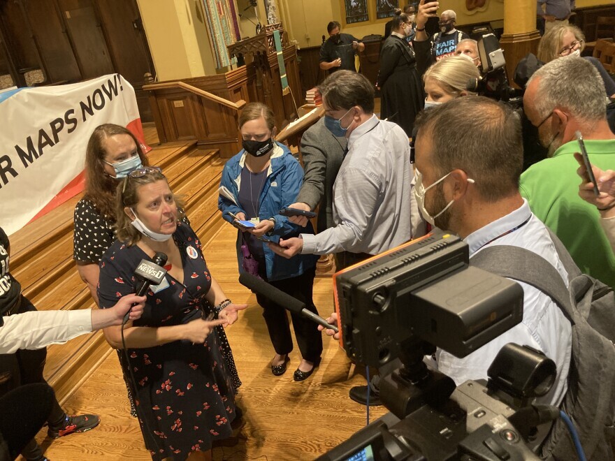 League of Women Voters executive director Jen Miller speaks to reporters after a "Fair Districts" rally at a downtown Columbus church near the Statehouse in September 2021. [Daniel Konik /  Statehouse News Bureau]