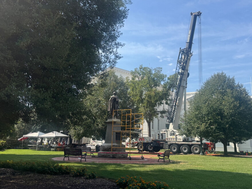 Scaffolding and a crane near the monument to Confederate General Stonewall Jackson outside the state capitol in Richmond.