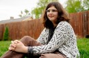 Chelsea Freels, a 17-year-old outside her home in Richmond Heights, Mo., on April 20, 2023. Freels, who is transgender, says she feels targeted by policies restricting gender-affirming care coming from Jefferson City, the state capital.