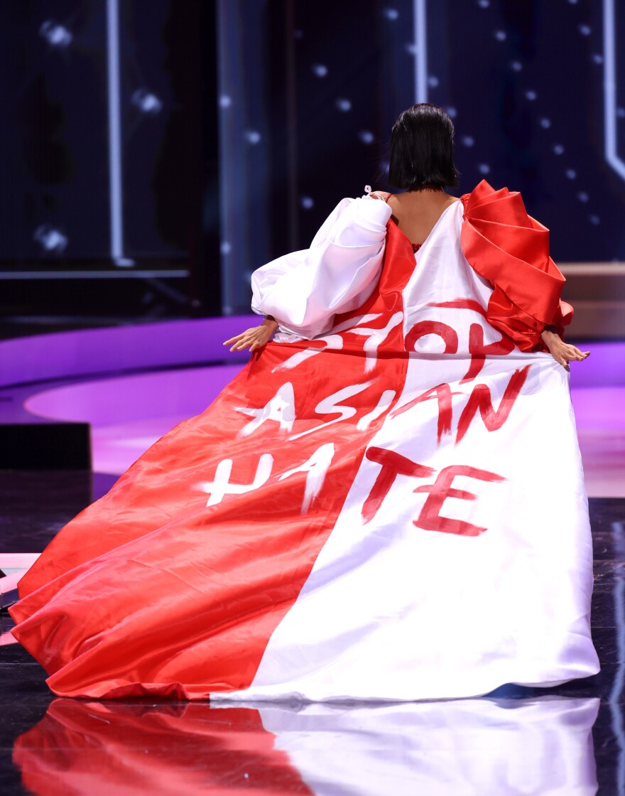 Miss Universe Singapore Bernadette Belle Ong appears onstage at the Miss Universe 2021.