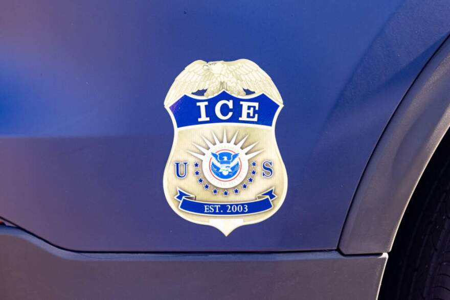 The ICE emblem on the side of a Homeland Security vehicle. (Jesse Costa/WBUR)