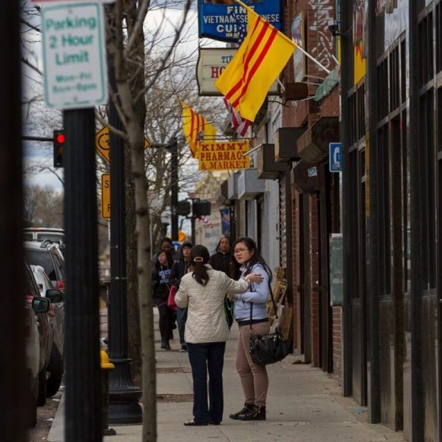 South Vietnamese flags fly over businesses down Boston's Dorchester Avenue ahead of the 40th anniversary of the fall of Saigon.