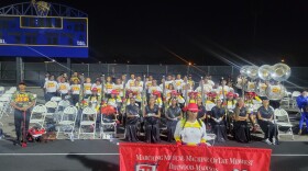 Image of the TM4, the Trotwood Madison Marching Music Machine, in the bleachers.