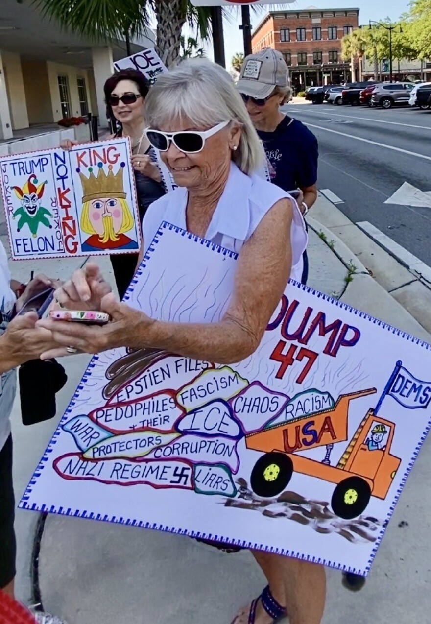 Karen Eide and a couple of other Stone Creek residents created elaborate handmade anti-Trump signs.