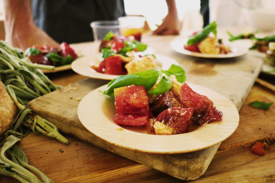 Caprese style heirloom tomato salad with Trattoria Stella's house-made mozzarella cheese.