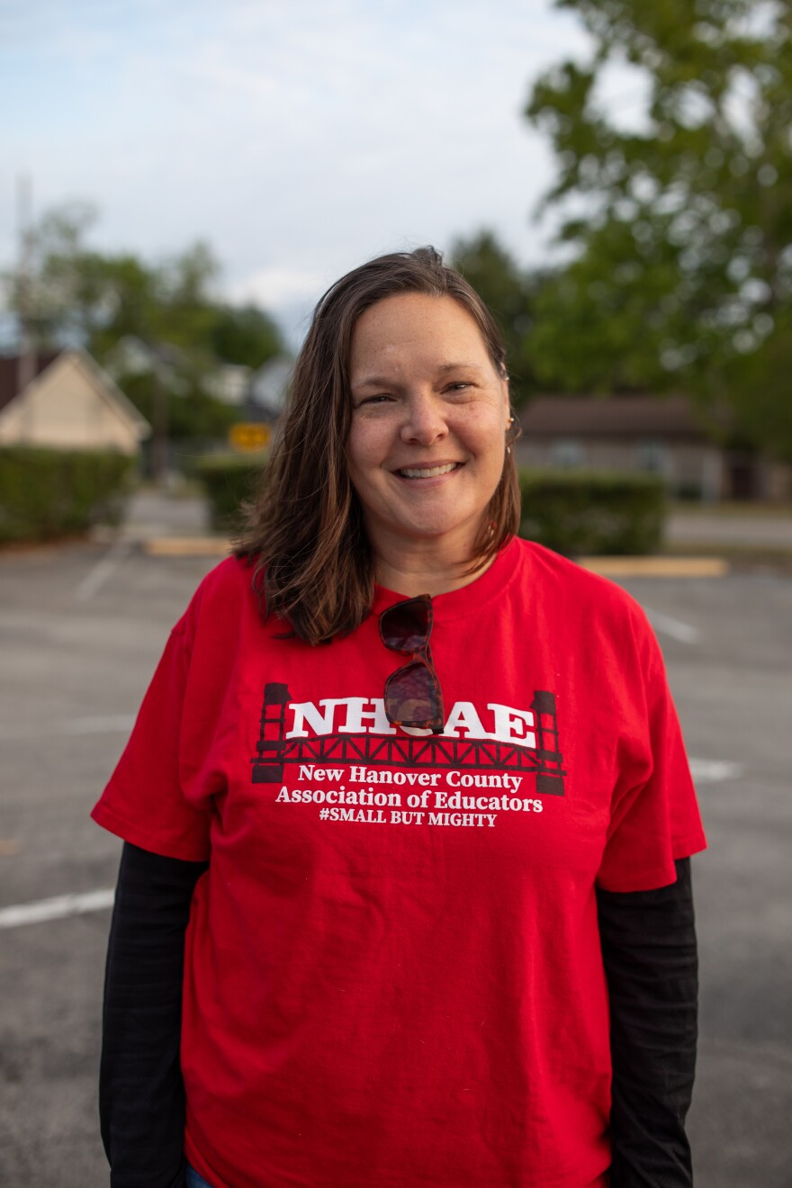 New Hanover County Schools teacher Lindsay Noble prepares to board a bus to Raleigh for the 'Kids Over Corporations' rally organized by the North Carolina Association of Educators on May 1, 2026. North Carolina is currently ranked 46th in the country for teacher pay.