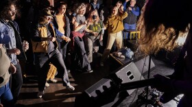 The crowd dances as local band Fluung performs at their self-titled third album release concert at Add-A-Ball in Fremont in April. Add-A-Ball sells pairs of earplugs for 50 cents a pair at the bar. 