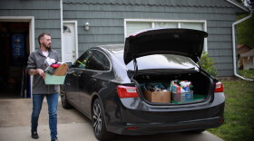  Alexxander Abreu, a Kansas Citian by heart, loads his car as he prepares to move out of state. 