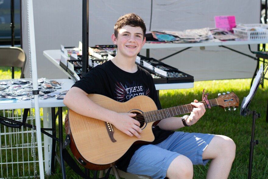 Samuel Messina is a home-schooled student who bought this Fender guitar by busking for tips.