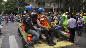 Rescue workers gather at Parque Mexico in the Condesa district the day after an earthquake on Sept. 20, 2017 in Mexico City. (Rafael S. Fabres/Getty Images)