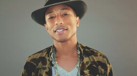 Pharrell, sporting more conventional headwear.