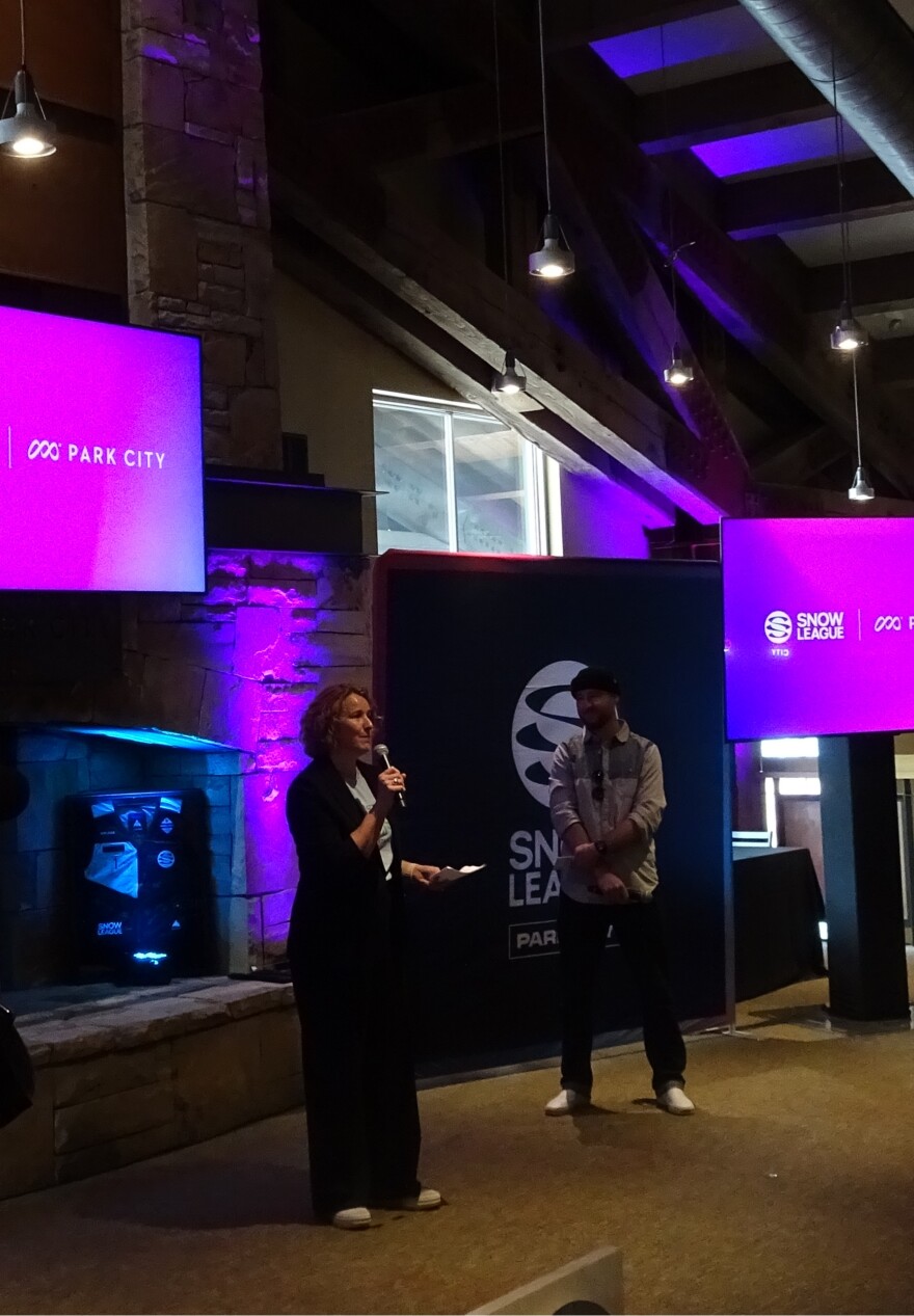 Jennifer Wesselhoff, President and CEO of the Park City Chamber of Commerce, spoke at a reception announcing the Jan. 2027 Snow League competition at the Park City Mountain Resort. Local leaders, including Mayor Ryan Dickey, attended.