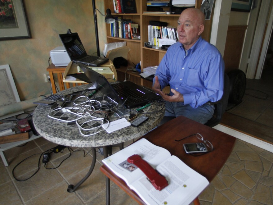 Mike Vanatta, 61, sits in the sunroom of his Vero Beach, Fla., home. Real estate experts debate the effect on the housing market of baby boomers' aging.