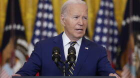 AP Biden immigration podium