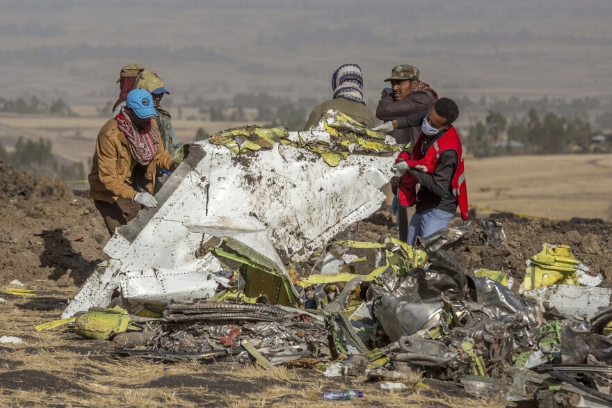 Responders at the scene of an Ethiopian Airlines flight crash. Countries around the world have grounded their Boeing 737 Max jets and there is growing political pressure on the Federal Aviation Administration to do the same.