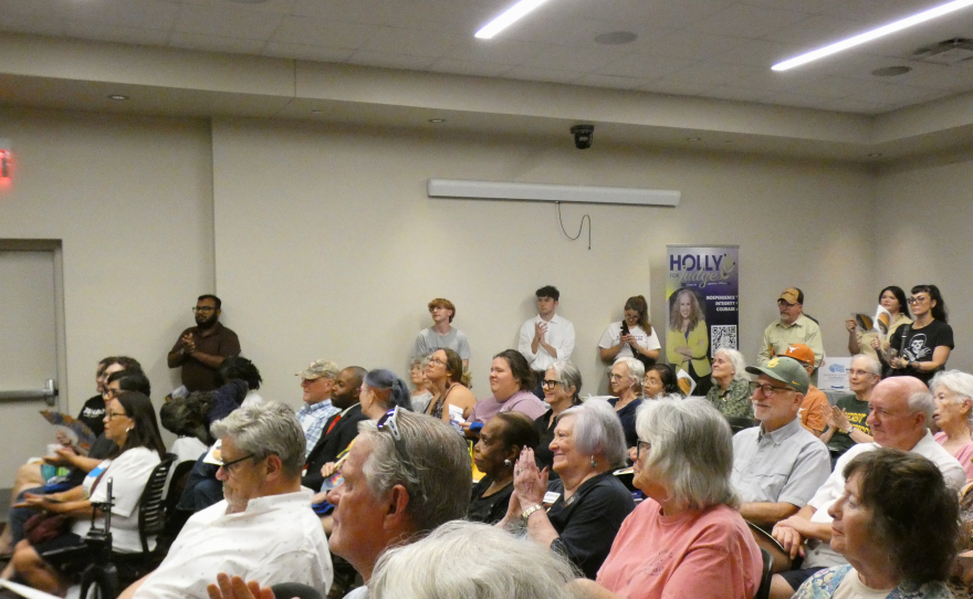 Audience members applaud during the Texas Democratic Party's South Plains Swing campaign stop.