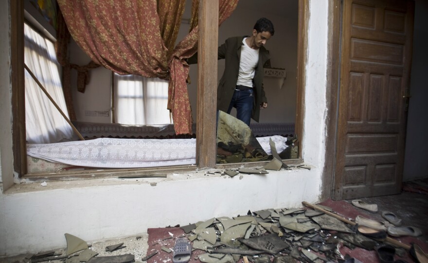 On Saudi Arabia's southern border with Yemen, there is another uprising, where Shiite rebels linked to Iran, known as Houthis, recently swept into the capital, Sanaa. Here, a Shiite Houthi man stands inside his house after a bomb explosion in Sanaa, Yemen, on Monday.