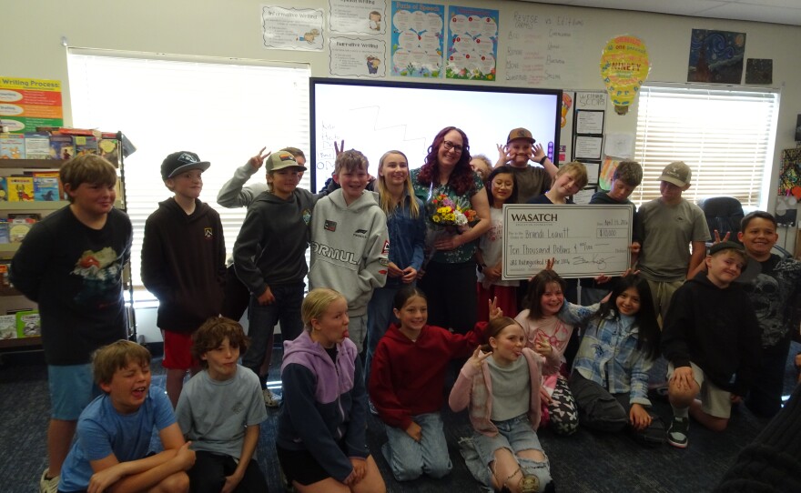 J.R. Smith Elementary School teacher Brandi Leavitt and her fifth grade class celebrate her recognition as a Distinguished Educator.