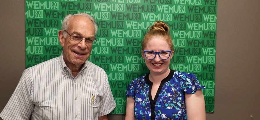 Norman Herbert and Madeline Garcia representing the Yvonne Fund at the Timko Broadcast Center.