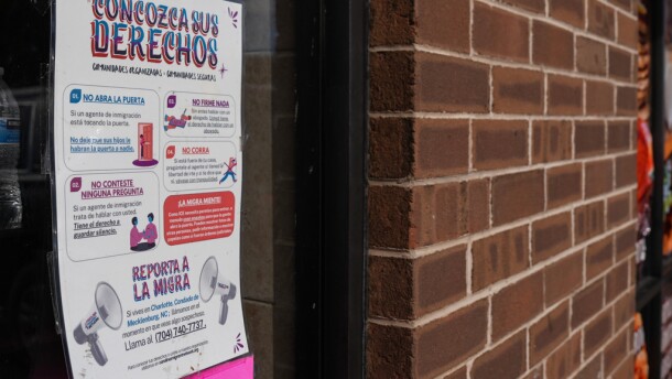 A sign in Spanish that reads at top: "Know Your Rights" is displayed outside of a restaurant store front, Thursday, Nov. 13, 2025, in Charlotte, N.C.