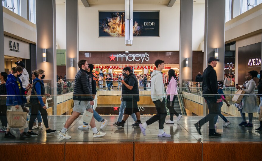 People shop at a mall in Houston, Texas.