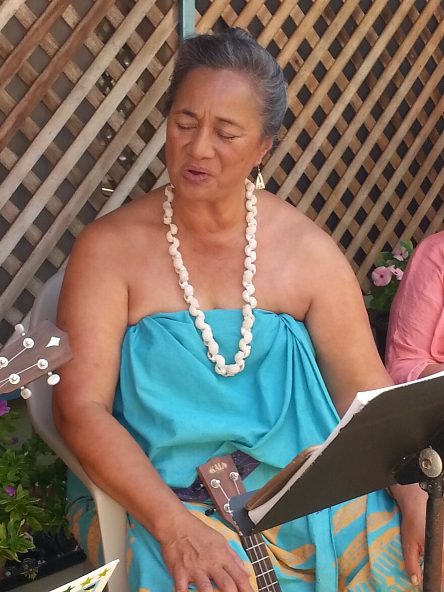 Sabra Kauka, seen singing, is a revered teacher of the island's Native Hawaiian culture.