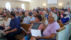 Hundreds of East Louisville residents attended a meeting about a planned concrete mixing facility across from the Lake Forest subdivision.