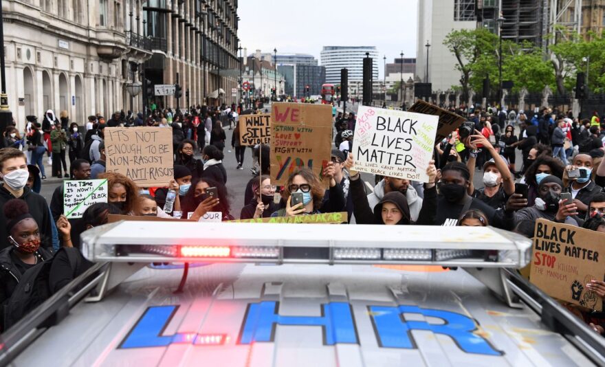 Protesters gather around a police car during an anti-racism demonstration in London, on June 3, 2020, after George Floyd, an unarmed black man died after a police officer knelt on his neck in Minneapolis, Minnesota. (Photo by DANIEL LEAL-OLIVAS / AFP) (Photo by )