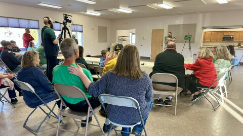 Greenway area residents listen to an announcement from Blandin Foundation Grants Director Kyle Erickson on Oct. 21, 2026 at the Marble City Hall.