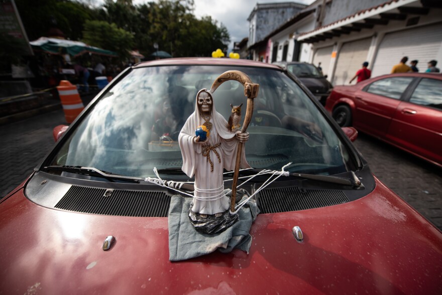 Car with a Santa Muerte